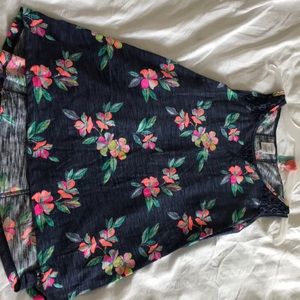 Dark blue tank top with flowers.